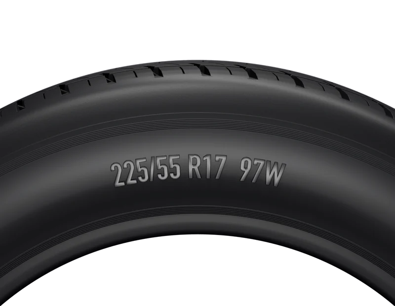 Zbliżenie boku opony: wytłoczony rozmiar 225/55 R17 97W na czarnej gumie, między barkiem a łukiem stopki.
